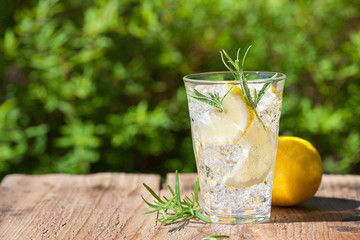 refreshing lemonade drink with rosemary in glasses - obrazy, fototapety, plakaty