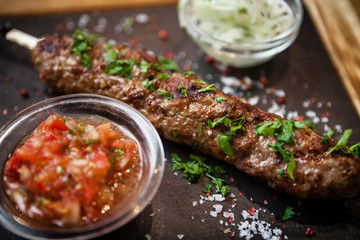 Lula kebab with tomato salsa