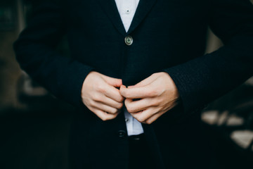 Groom getting ready in the morning