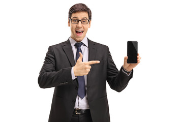 Businessman showing a phone and pointing