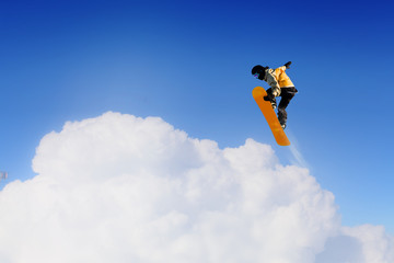 Snowboarder making jump