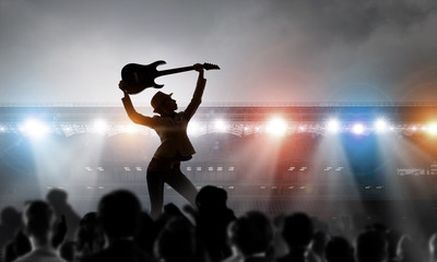 Rock girl with guitar. Mixed media