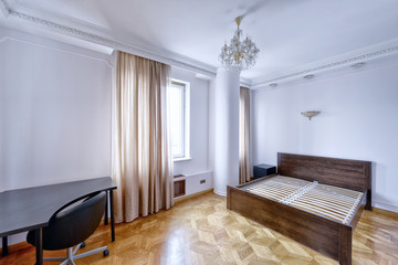 Modern interior of a bedroom in the new house