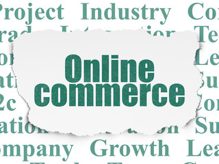 Finance concept: Online Commerce on Torn Paper background
