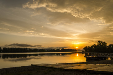 beauty summer sunset by Danube on beach