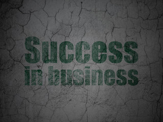 Finance concept: Success In business on grunge wall background