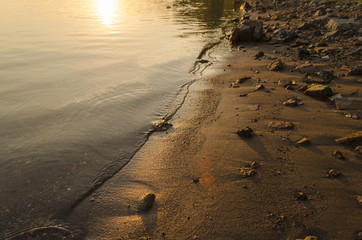 Fototapeta na wymiar beauty summer sunset by Danube on beach
