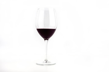 Glass Of Deep Red Wine Isolated On White Background