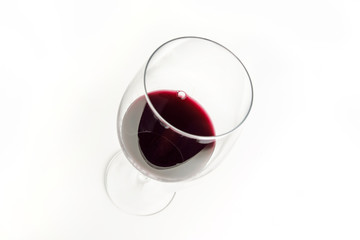 Glass Of Deep Red Wine Isolated On White Background