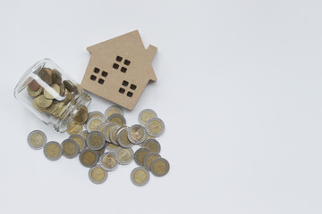 Mortgage loan and Coins of thailand property for concept with copy space