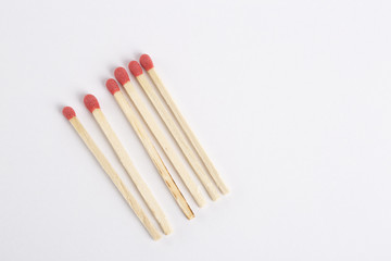 High angle of matches isolated on white.