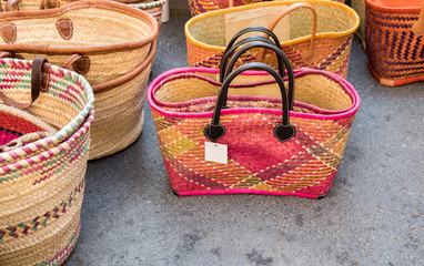Colorful handmade bags for sale at local street market. Provence. France