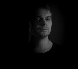 Black and white portrait of a young man.