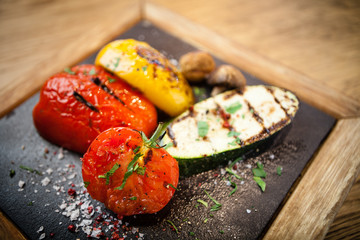 Grilled vegetables on a stone board