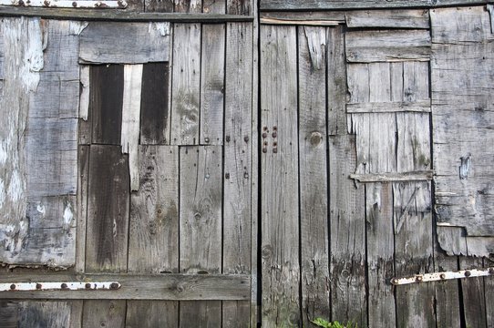 background of wooden old doors made of planks
