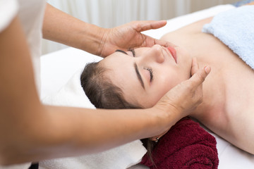 Close up of Beautiful young woman having head massage in spa salon wellness, Beauty healthy lifestyle and relaxation concept