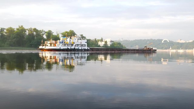 Ship with barge in the Dnepr river near Kiev