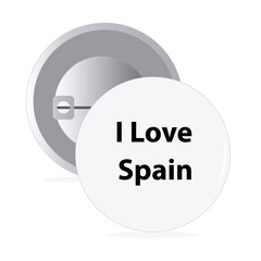 White round pin with text Spain
