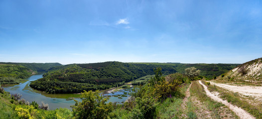 River canyon with green hills