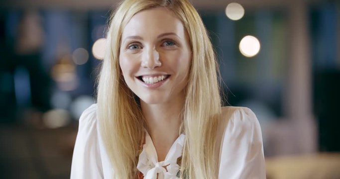 Blonde woman smiling to camera portrait.Corporate business team work office meeting.Caucasian businessman and businesswoman people group talking together.Collaboration,growing,success.4k video