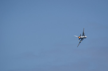 ATTACK AIRCRAFT - A combat aircraft in the blue sky