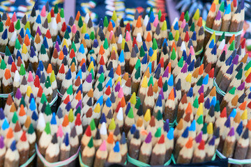 Fototapeta premium bunch of colorful vivid pencils on market