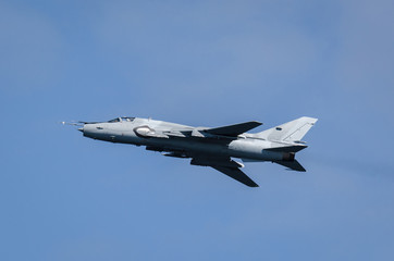 Fototapeta na wymiar ATTACK AIRCRAFT - A combat aircraft in the blue sky