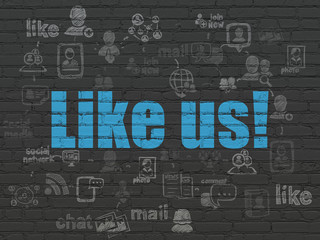 Social media concept: Like us! on wall background