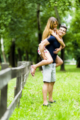 Obraz premium Happy couple in love having fun outdoors