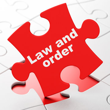 Law concept: Law And Order on puzzle background