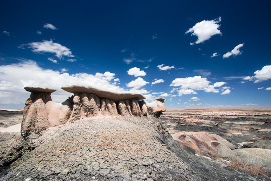 large hoodoo rock formation in a washed out river basin in a rocky desert in the southwest of the USA