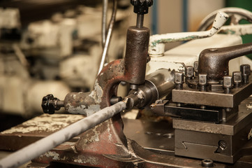 Drill holes with a drill on a lathe.