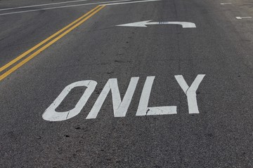 The arrow and the word only painted white on the road.