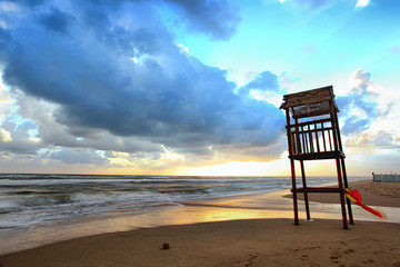 Landscape of beach with the wooden lookout tower