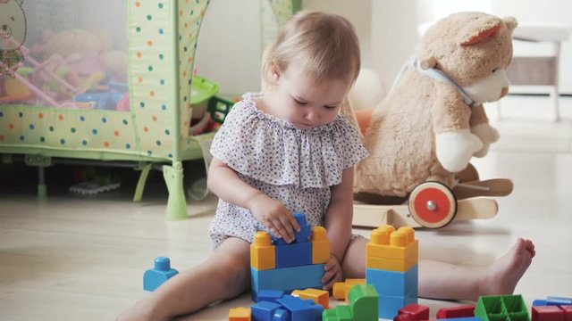 child little girl playing wooden toys at home or kindergarten, baby kid intellectual games children's desinger