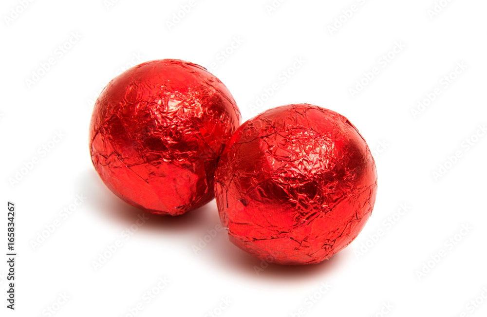 Sticker chocolate candies in foil isolated