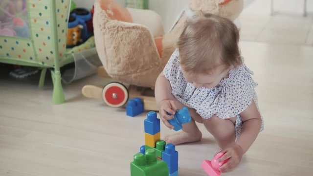child little girl playing wooden toys at home or kindergarten, baby kid intellectual games children's desinger