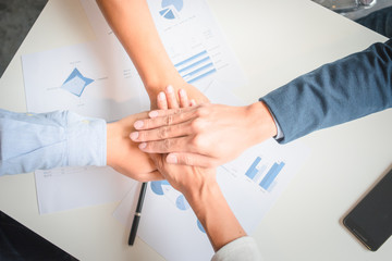close shut business team meeting data sheet  and smartphone for success job