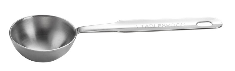 Metal measuring spoon tablespoon. Isolated on white background.