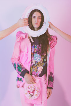 Fashion Model With Long Hair Posing in Pink Floral Costume