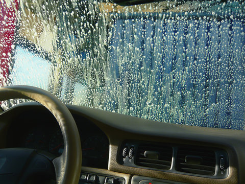 Color effects on soapy wind shield in car wash