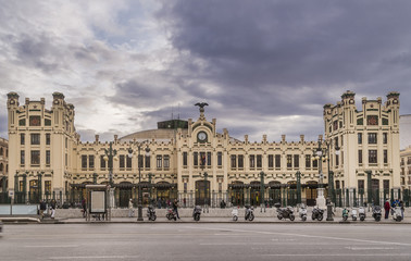 Fototapeta na wymiar The famous Estacio del Nord, North Station, Valencia, Spain, under a dramatic sky