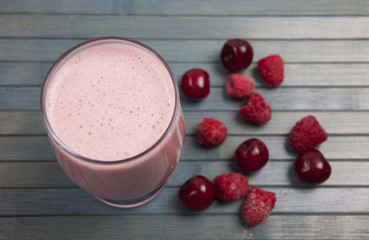 Smoothies with a cherry and raspberry