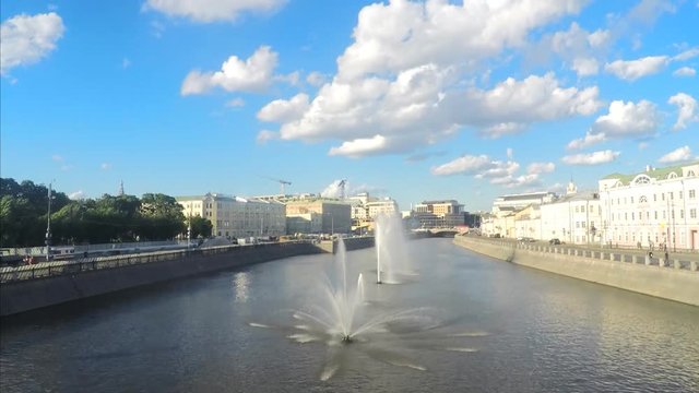 Fountains on river in sunny summer day timelapse