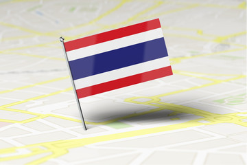 Fototapeta na wymiar Thailand national flag location pin stuck into a city road map. 3D Rendering