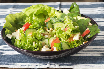 fresh salad wih lettuce selective focus
