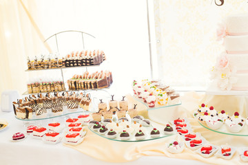 Different kinds of baked sweets on a buffet