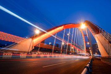 Fototapeta na wymiar motion blurred traffic on bridge,chongqing china.