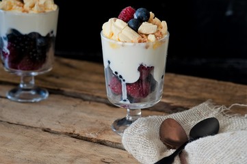 Delicious dessert with yogurt and berries
