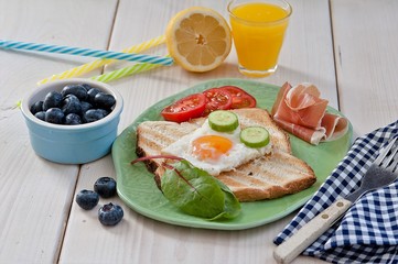 Healthy breakfast, muesli, juices and scrambled eggs
